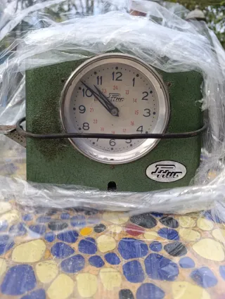 Reloj de sellar vintage verde