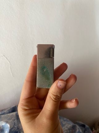 Encendedor antiguo metálico