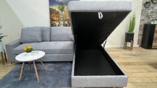 Elegante sofa rinconera con arcon y cama