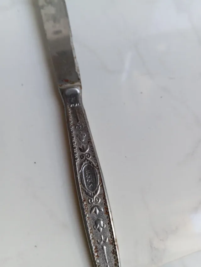 Set di posate antiche in alpaca