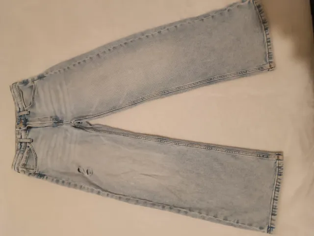 Vaqueros niña desgastados