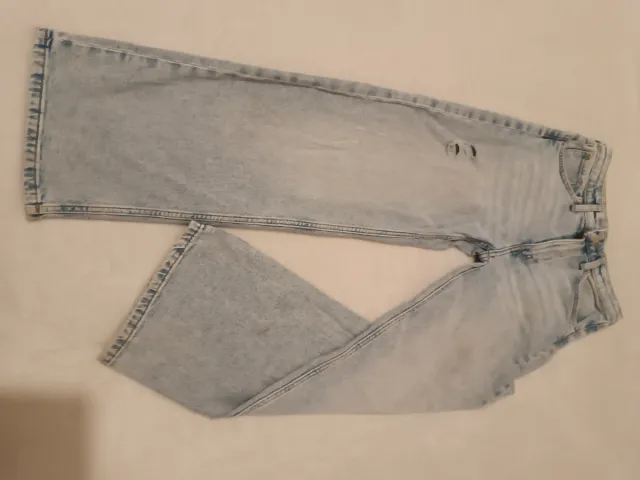 Vaqueros niña desgastados