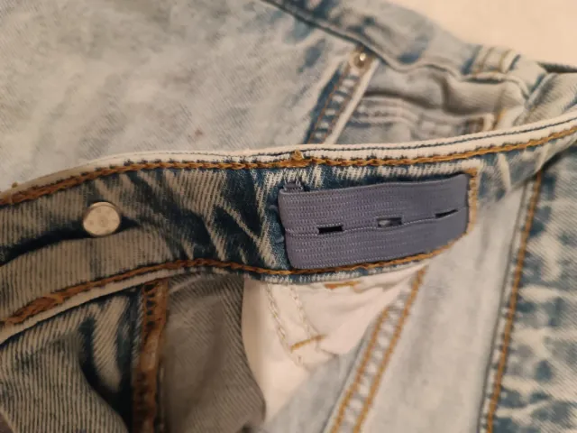 Vaqueros niña desgastados