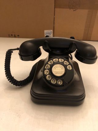 Teléfono antiguo baquelita negro