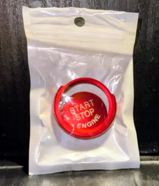 Botón de arranque Start Stop Engine rojo