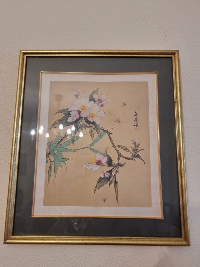 Lamina decorativa con cornice dorata