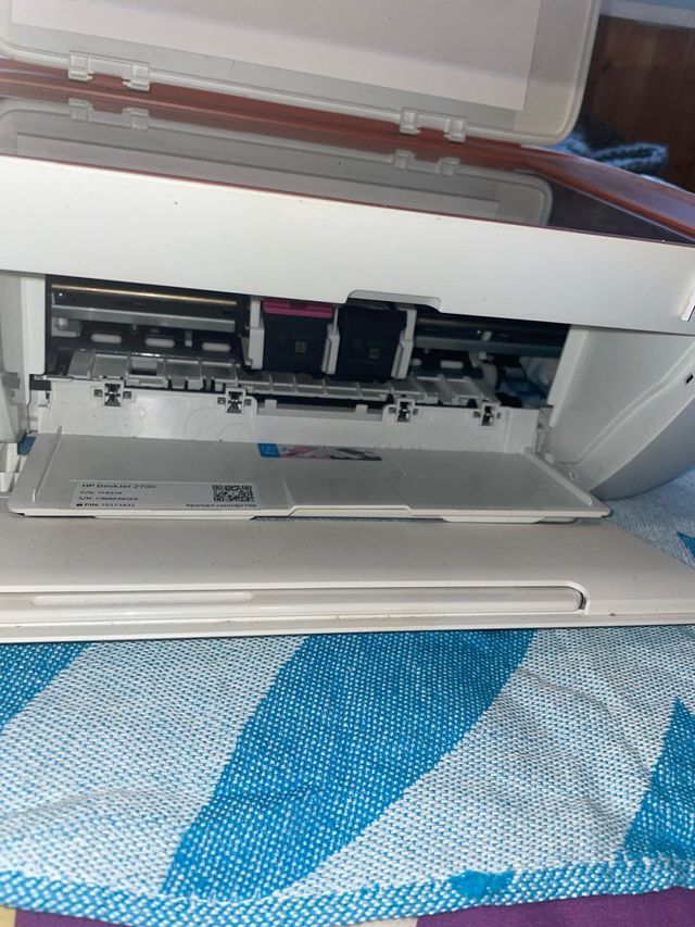 Stampante HP rossa e bianca (leer)