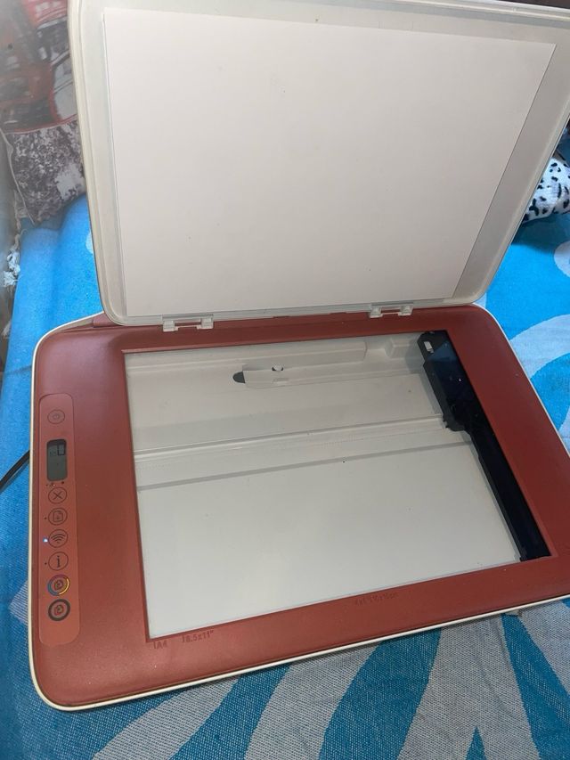 Stampante HP rossa e bianca (leer)