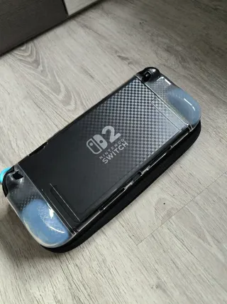 Nintendo Switch + Fundas y protecciones