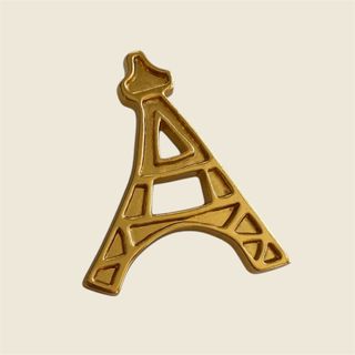 Broche Torre Eiffel Yves Saint Laurent Dorado
