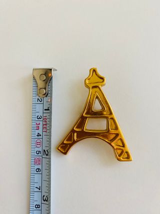 Broche Torre Eiffel Yves Saint Laurent Dorado
