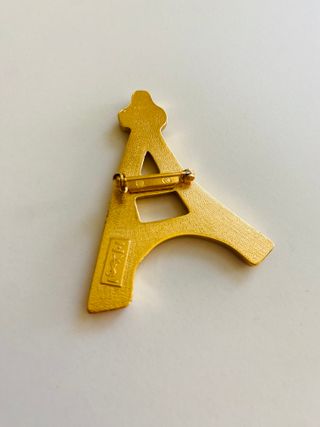Broche Torre Eiffel Yves Saint Laurent Dorado