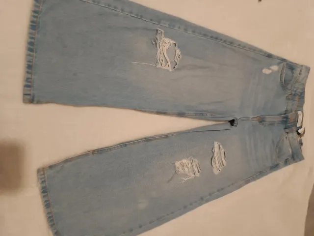 Vaqueros niña rotos desgastados