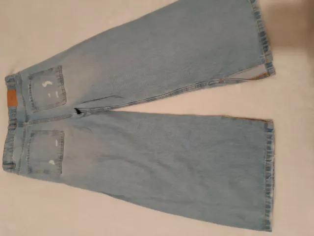 Vaqueros niña rotos desgastados