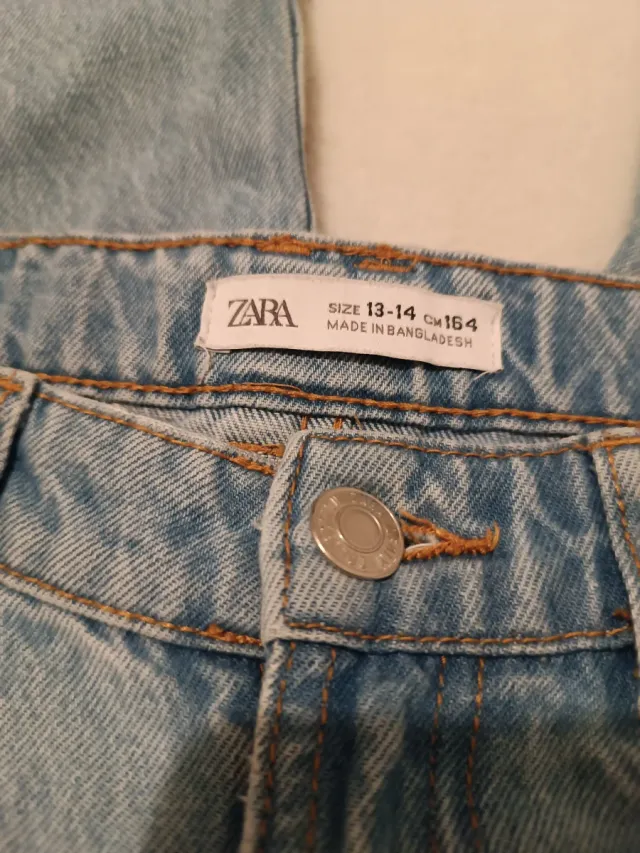 Vaqueros niña rotos desgastados