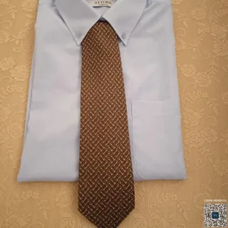 Cravatta fantasia geometrica marrone