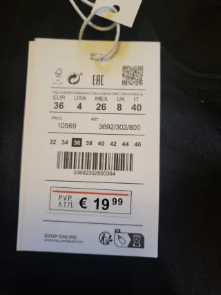 Shorts negros T-36 rotos