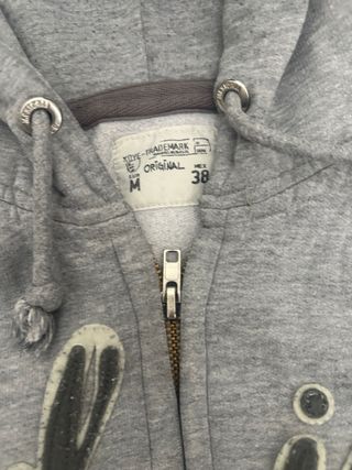 Sudadera gris con cremallera Talla M
