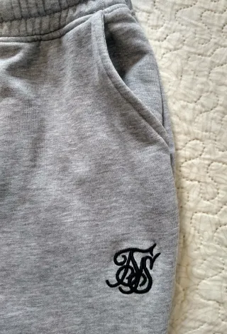Pantalón chándal SikSilk gris talla M