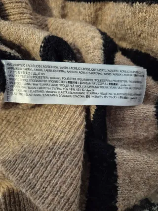 Jersey de rayas beige y negro