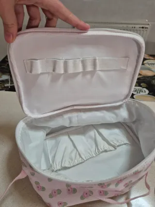 Bolsito La Nina flores rosas bebé reborn