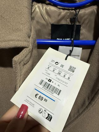 Chaqueta larga beige oversize