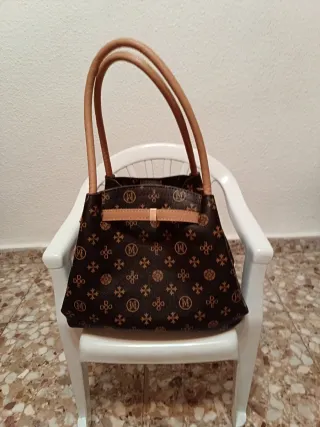 Bolso de mano estampado