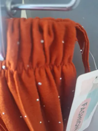 Falda plisada color teja