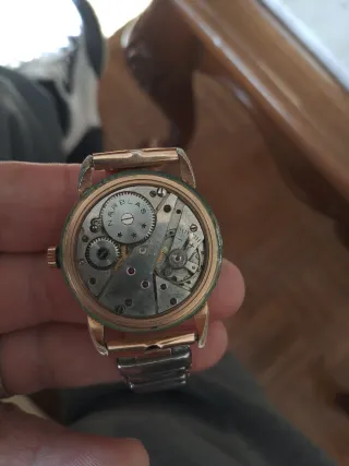 Reloj de pulsera dorado Escucho ofertas