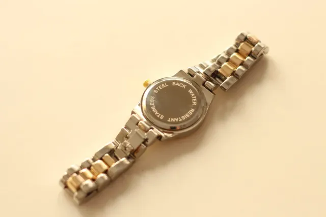 Reloj Mujer Oro y Plata.