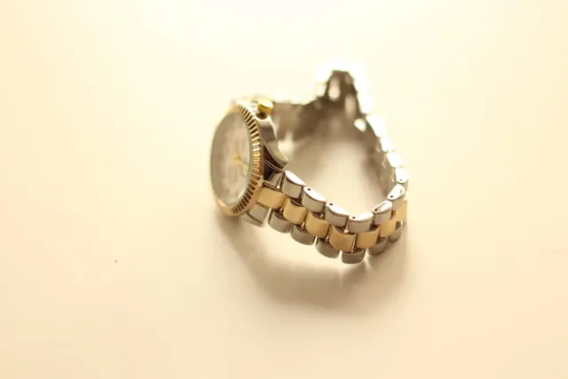 Reloj Mujer Oro y Plata.