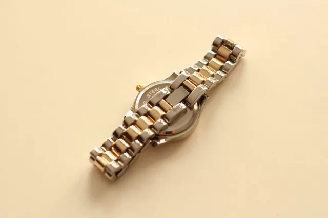 Reloj Mujer Oro y Plata.