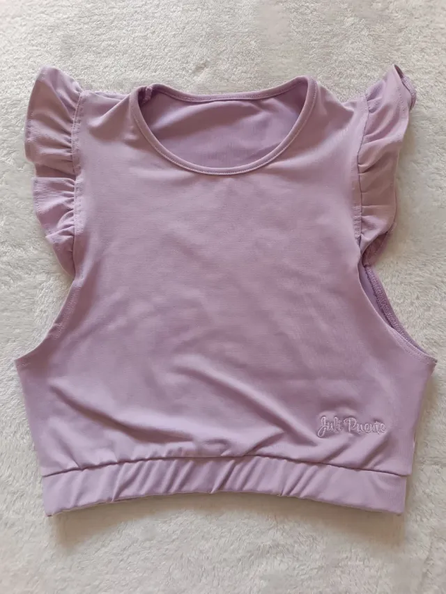 Camiseta niña lila volantes