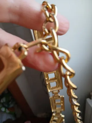 Cintura vintage dorata con pendente