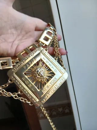 Cintura vintage dorata con pendente