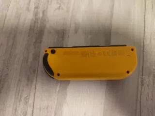 Mando Nintendo Switch Morado y Amarillo sólo envío