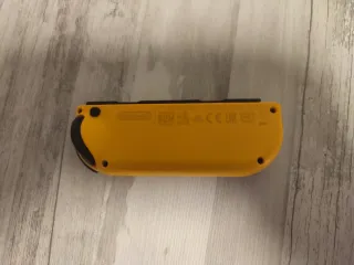 Mando Nintendo Switch Morado y Amarillo sólo envío