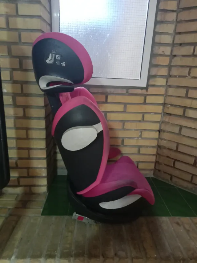 Silla de coche Isofix rosa y negra y rosa