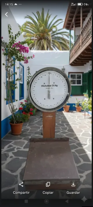 Antigua pesa de 25 kg