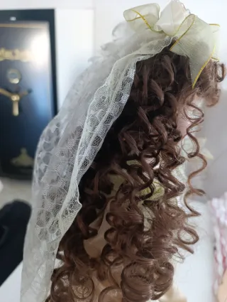 Muñeca de porcelana antigua