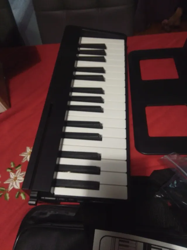 Piano 61 teclas plegable