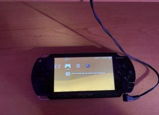 PSP Negra con 3 Juegos