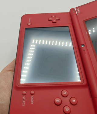 Nintendo DSi XL Rosso 25° Anniversario Mario