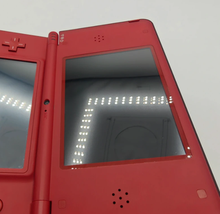 Nintendo DSi XL Rosso 25° Anniversario Mario