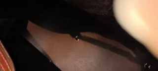 Bolsas de viaje verdes y marrones