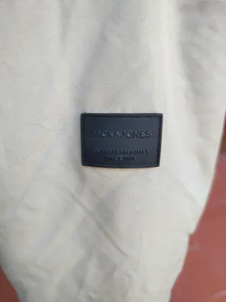 Cazadora invierno hombre beige y negra