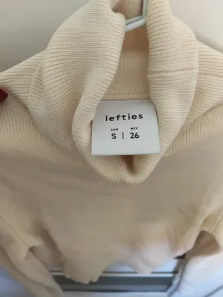 Camiseta cuello alto beige manga larga