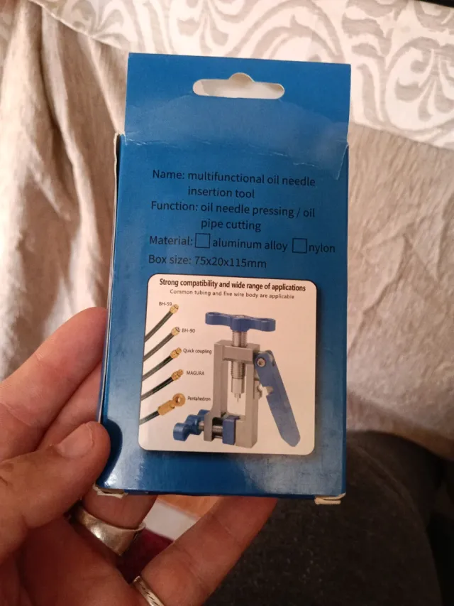 Herramienta inserción aguja bicicleta