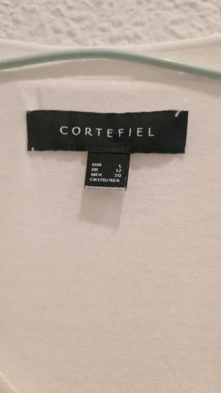 Blusa blanca, con forro parte delantera, talla L