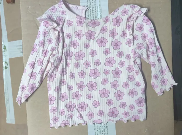 Blusa de manga larga con flores rosas